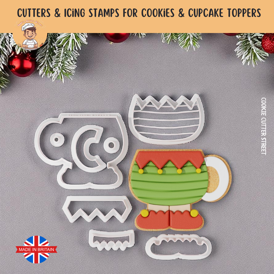 Elf Cup cookie cutters and icing stamps for cookies and cupcake toppers on a gray background with Christmas decorations.