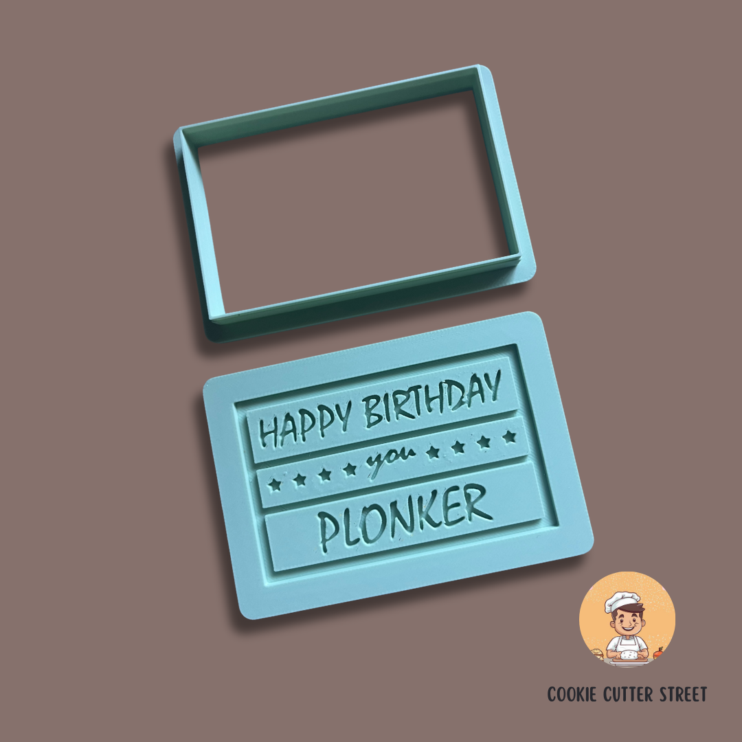 An Only Fools and Horses-themed cookie cutters and icing embossers, featuring a plaque saying "Happy Birthday you Plonker"