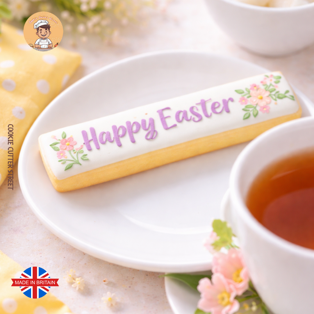 cookie stick on a saucer next to a cup of tea
