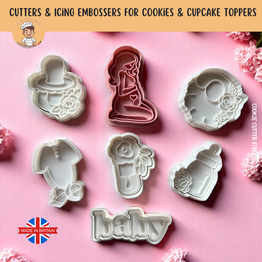 A set of floral baby shower-themed cookie cutters and icing embossers, including baby vest, bottle, pregnant silhouette, floral pacifier, and “baby” word design.