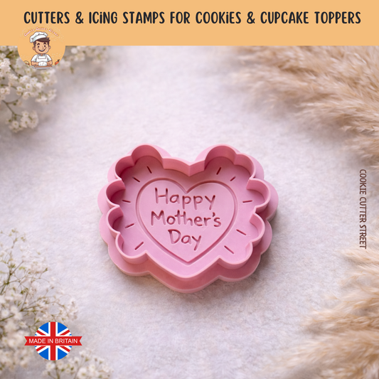 Pink heart-shaped cookie cutter with 'Happy Mother's Day' text on a soft white background