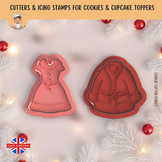 Two cookie cutters shaped like a dress and a Santa jacket on a festive background with Christmas decorations.