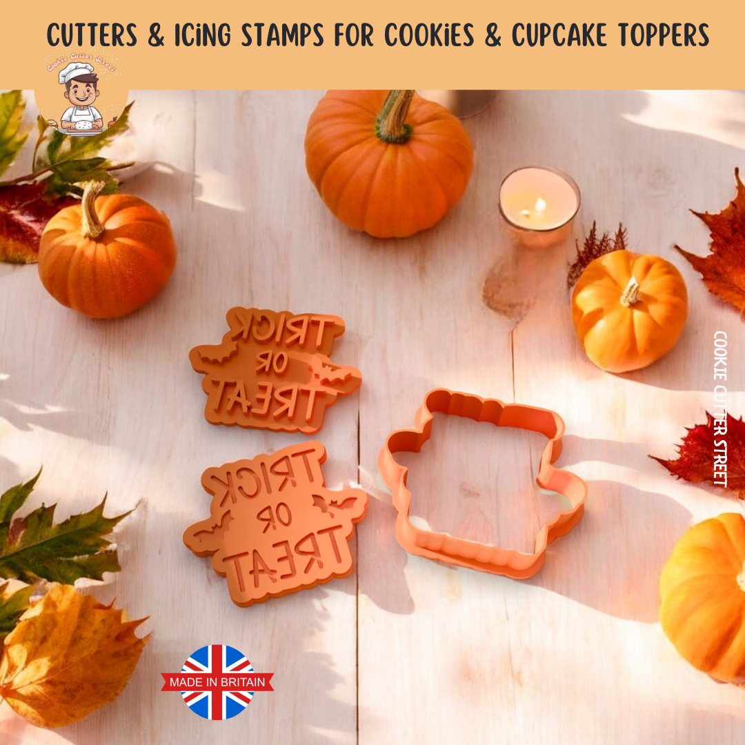Cookie cutters with 'Treat or Treat' text and a pumpkin-shaped cutter on a wooden surface with pumpkins and leaves.